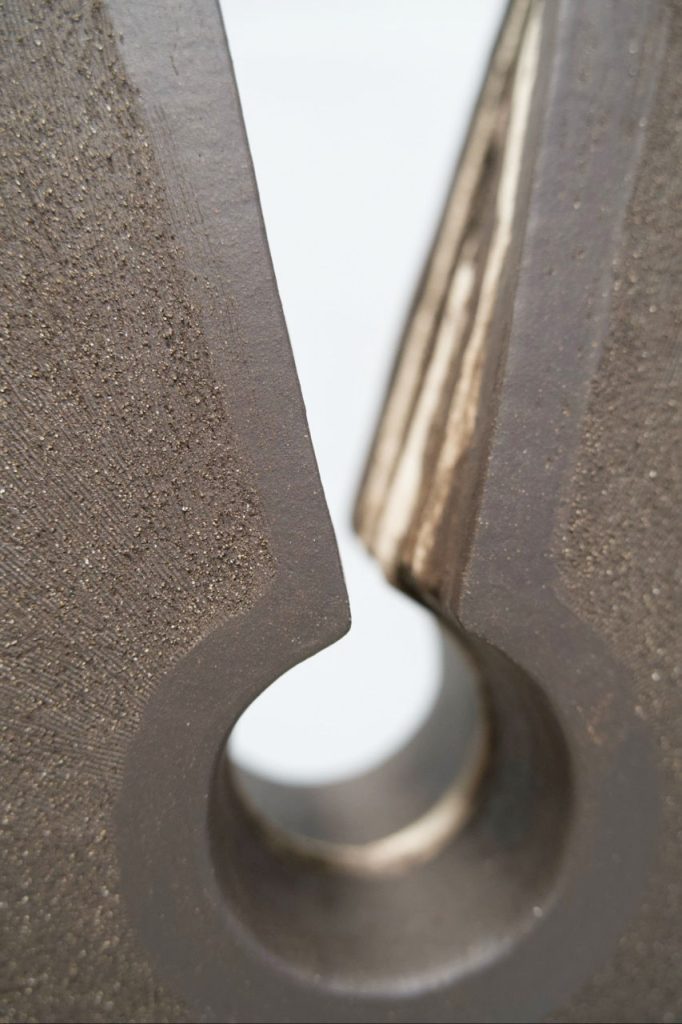 black ceramic disc sculpture